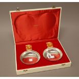A pair of Aurum silver and silver gilt limited edition dishes,