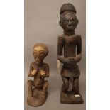 Two central African carved wooden fertility figures, the tallest 70cm, (2).