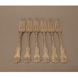 Six Victorian silver double struck King's pattern table forks, each crest engraved,