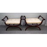 A pair of late 19th century mahogany X- framed stools, with turned end stops,