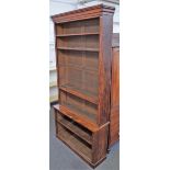 A Victorian figured walnut double height open bookcase, 130cm wide x 262cm high.