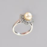 A diamond and cultured pearl hexagonal cluster ring,