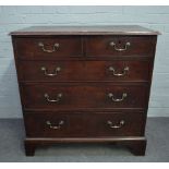 A mid-18th century oak chest of two short and three long graduated drawers, 95cm wide x 97cm high.