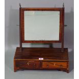 A 19th century mahogany two drawer toilet mirror on bracket feet, 40cm wide x 48cm.