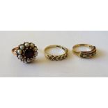 A 9ct gold, emerald and diamond nine stone half hoop ring,