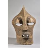 Central Africa, Songye tribe, Kifwebe mask, polychrome painted carved wood with central crest,