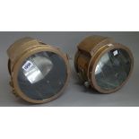 A pair of eight inch Rushmore brass cased searchlights by Rushmore Dynamo works.