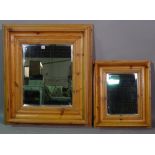 A 20th century pitch pine framed mirror with split beading border decoration,