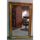 A 19th century gilt framed rectangular mirror, 81cm wide x 130cm high.