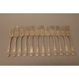 Twelve silver double struck King's pattern tableforks,