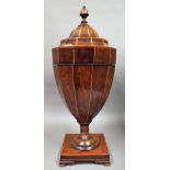 A George III inlaid mahogany urn shape knife box with pop up lid on square base,