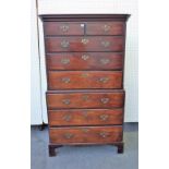 A George III mahogany chest on chest of two short over six long graduated drawers on bracket feet,