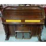 An early 20th century mahogany pump organ, 131cm wide x 112cm high.