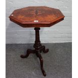 A Victorian marquetry inlaid figured walnut octagonal occasional table, on carved tripod base,