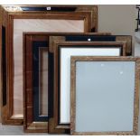 A group of four modern gilt plaster and painted frames, (4).