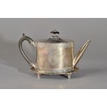 A George III silver teapot, of oval form, the body engraved with a shield and a motto,