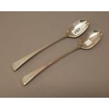 A pair of George III silver Hanoverian pattern stuffing spoons, London 1782, crest engraved,