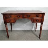 A Regency mahogany four drawer side table, on ring turned supports, 106cm wide x 80cm high.