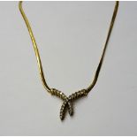 A 9ct gold and diamond set necklace,