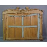 A 19th century pine mirror frame with shell crest and acanthus decoration, 155cm wide x 131cm high,