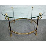 A mid-20th century lacquered brass and glass circular coffee table, 80cm diameter x 43cm high.