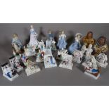 A group of four Nao figures and a quantity of mostly 20th century Continental figural bookends,