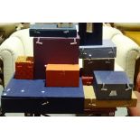 A large quantity of Asian storage boxes, mostly covered in silk, (qty).