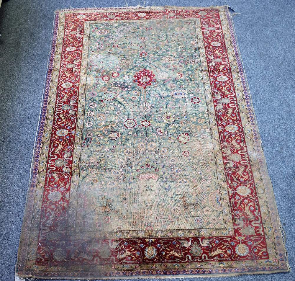 An antique rug, possibly a Kashan Souf,