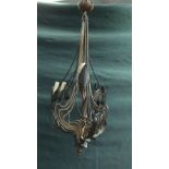 An Art Nouveau nine branch gilt metal chandelier in the manner of WAS Benson,