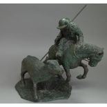 Matador and Bull, patinated bronze group, signed 'E SERRA 1939' to the cast, 34cm high.