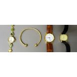 A 9ct gold torque bangle, weight 4 gms, a Sekonda Quartz lady's wristwatch,