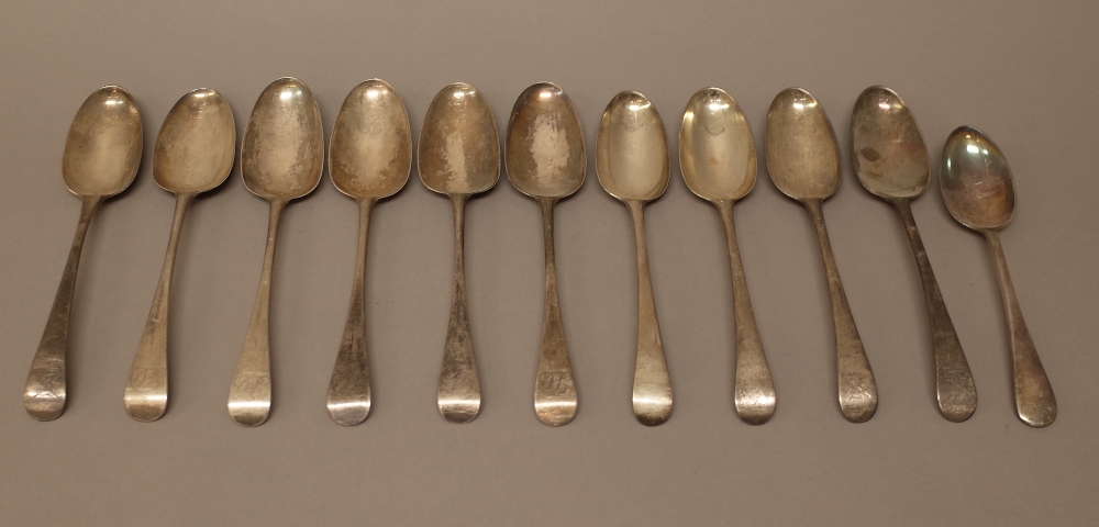 Silver Old English pattern table flatware, comprising; five bottom marked table spoons,