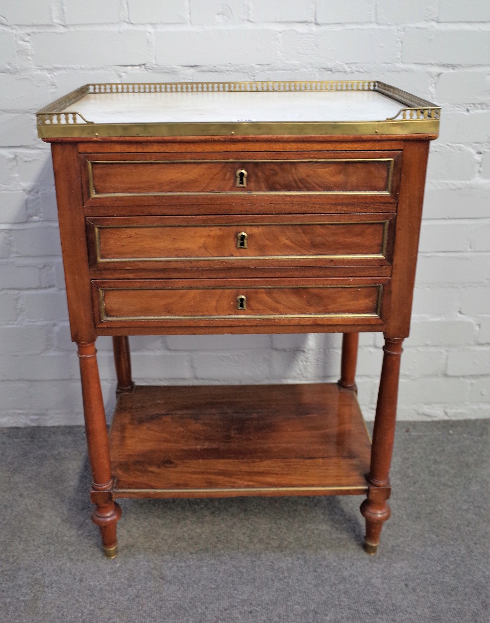 A 19th century French petite commode,