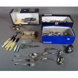 A quantity of plated table flatware, including knives, forks and spoons, a soup ladle,