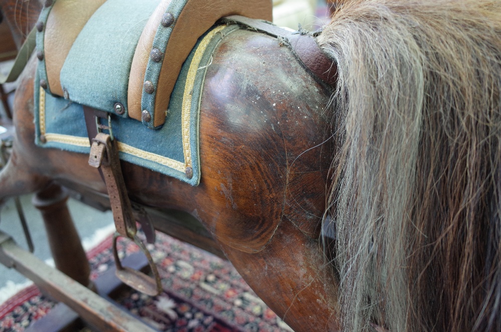 An early 20th century stained pine rocking horse on a wrought iron and stained pine swing frame - Image 6 of 7