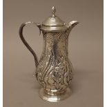 A George III silver hot water jug, of baluster form,