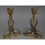 A pair of Regency ormolu candlesticks, circa 1830, after a design by William Bateman for Rundell,