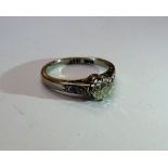 A platinum and white gold, diamond ring,