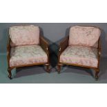 A 20th century walnut framed three piece bergere suite, the sofa 135cm wide x 74cm high. (3).