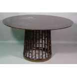 A 20th century hardwood circular dining table on faux bamboo base,