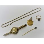 A 9ct gold circular cased lady's wristwatch, Birmingham 1933 on a sprung bar link 9ct gold bracelet,