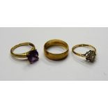 A 9ct gold ring, claw set with a circular cut amethyst,