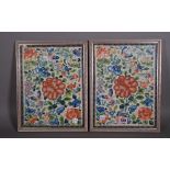 A pair of Chinese embroidered panels, circa 1900, worked with flowers and insects, 28cm x 20.5cm.