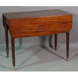 A George III circular mahogany tripod table,