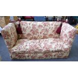A 20th century Knole settee with floral upholstery, 180cm wide x 100cm high.