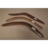 Three Australian Aboriginal hardwood boomerangs, the longest 61cm (3).