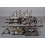 Metalware including assorted longcase clock weights, elements of fire dogs,