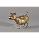 A Victorian silver cow creamer, the standing model of a cow with a hinged lid and fly thumbpiece,