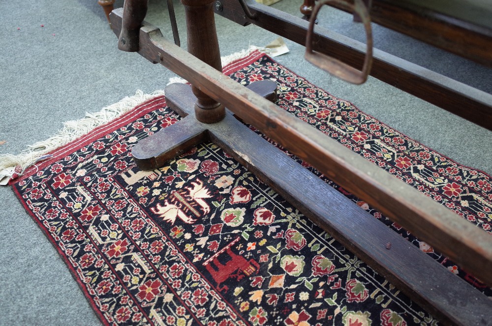 An early 20th century stained pine rocking horse on a wrought iron and stained pine swing frame - Image 5 of 7