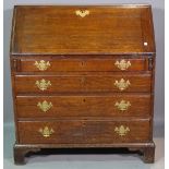 A George III oak bureau with fitted interior over four long graduated drawers, on bracket feet,